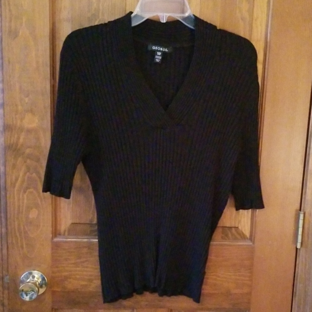 V neck sweater.